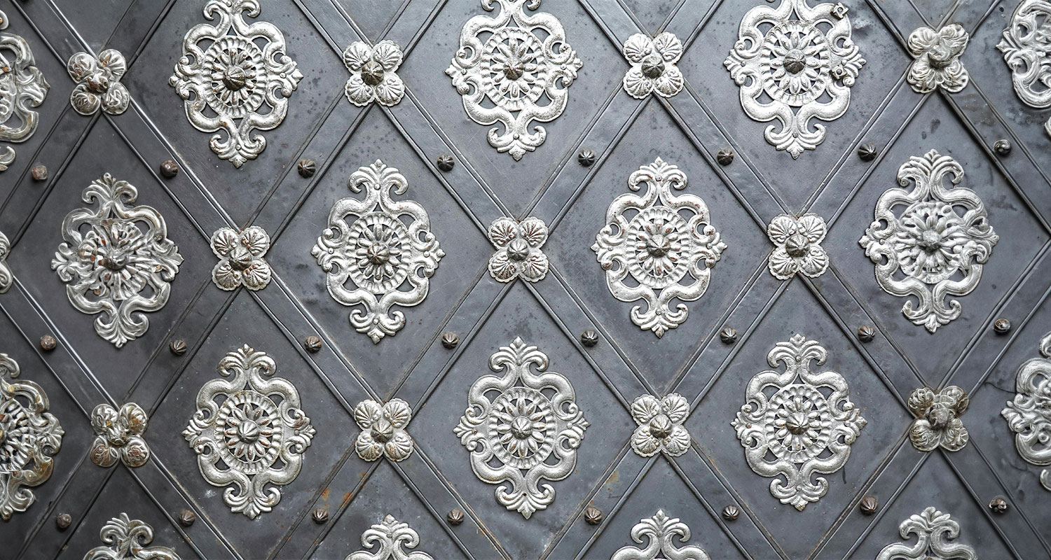 Strength and Elegance: The Art of Ornate Iron Doors